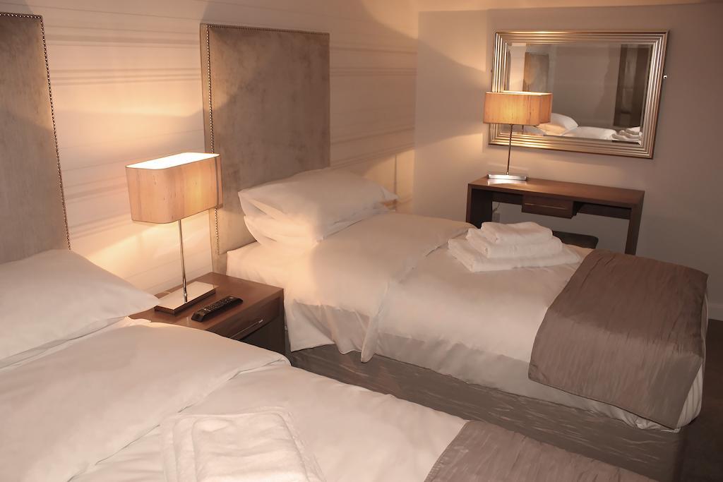 Mccafferty'S Guesthouse Ilford Ruang foto